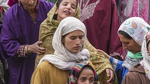 Bereaved family members of Syed Adil Hussain Shah, a pony ride operator who was killed in the terror attack at Pahalgam.