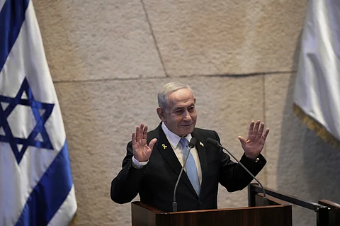 Israel's Prime Minister Benjamin Netanyahu delivers a welcome message during a visit by Argentina's President Javier Milei to the Knesset, Israel's parliament, in Jerusalem, Wednesday, June 11, 2025.