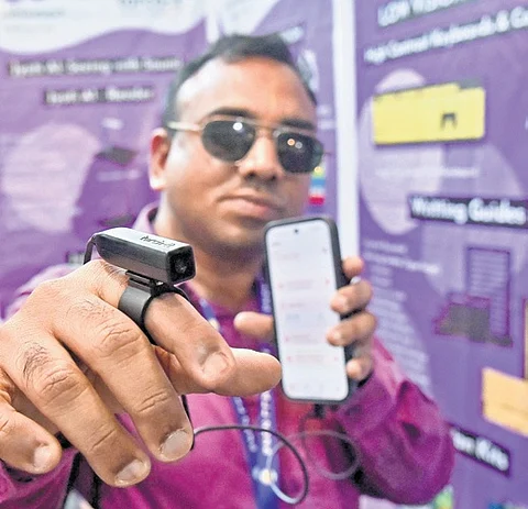 A visually-challenged person tests AI smart glasses with real-time text recognition