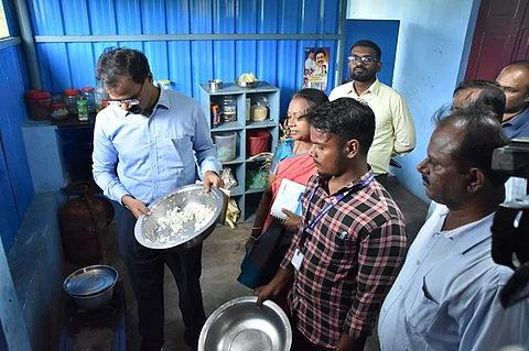 Officials inspecting the destitute home in Sundarapandiapuram, Tenkasi district, following the suspected food poisoning incident.
