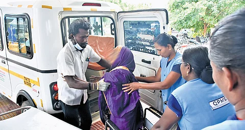An inmate of the private home for the elderly and persons with mental health issues in Sundarapandiapuram is being taken to the hospital in an ambulance