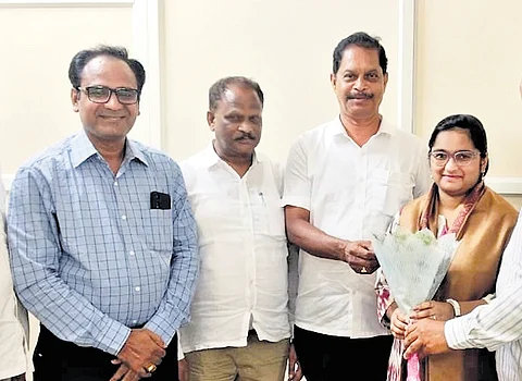 District Educational Officer (DEO) S Mondaiah felicitates Shubhashree in Karimnagar on Saturday.
