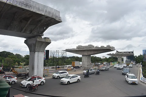 With the 10.1-kilometre-long flyover nearing completion, the last major hurdle involves installing eight massive iron girder beams