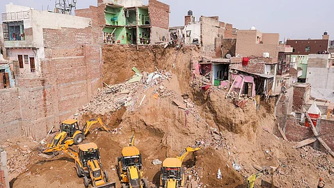 Rescue operation underway after a multi-storey building and several other houses collapsed, in Mathura.