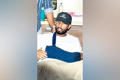 An injured Mohammed Hanif, who lost his wife Jasna Makkar and daughter Roohi Mehrin in the Kenya bus accident, is being shifted to an ambulance upon his arrival at the Kochi airport
