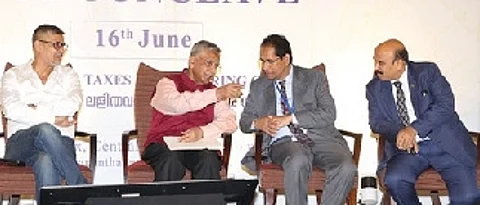 R Venkataramani, Attorney General of India, engaged in a conversation with S K Rahman, chief commissioner, Central Tax, Central Excise & Customs, Thiruvananthapuram during the ‘GST Conclave 2025’ held in Kochi.