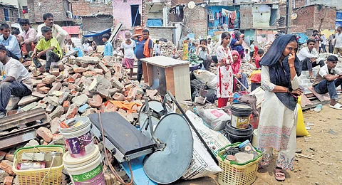 Demolition drive carried out near railway-side jhuggis in CSA Colony, Wazirpur industrial area.