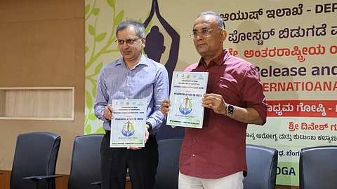 Health Minister Dinesh Gundu Rao released a poster and curtain raiser to International Day of Yoga here on Tuesday.