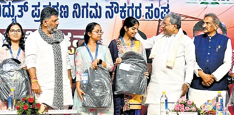 CM Siddaramaiah, DyCM DK Shivakumar and Energy Minister KJ George at the inauguration of the diamond jubilee celebrations of the Karnataka Electricity Transmission Corporation Employees’ Association in Bengaluru on Wednesday