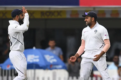 Virat Kohli (L) and Rohit Sharma