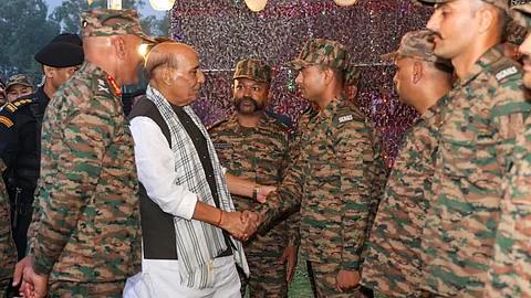Rajnath Singh interacting with the Armed Forces Personnel during ‘Barakhana’ at Northern Command HQ in Udhampur.