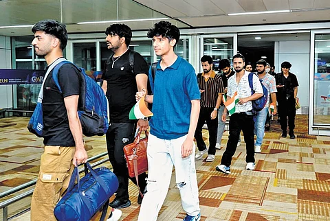 Indians arrive in New Delhi after being evacuated from Iran through a special flight, as part of ‘Operation Sindhu’, on Sunday