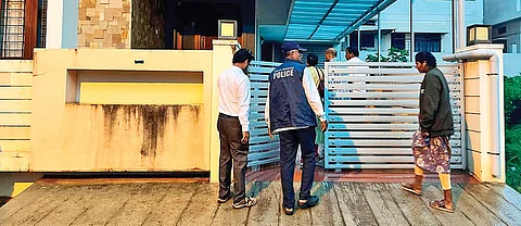 Lokayukta officials during their raids in Bengaluru, on Tuesday