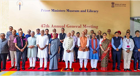 In this image via PMO on June 23, 2025, Prime Minister Narendra Modi during a group photo at the 47th Annual General Meeting of the Prime Ministers' Museum and Library Society, in New Delhi.