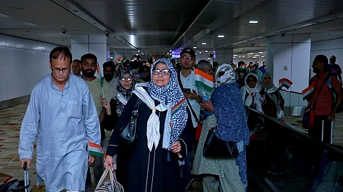 Indian nationals upon their arrival at Delhi airport from Iran under Operation Sindhu, late Sunday night, June 22, 2025. A special flight from Mashhad brought back 285 evacuees, taking the total number of Indians repatriated from Iran to 1,713.