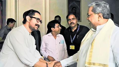 CM Siddaramaiah and actor Aamir Khan exchange pleasantries in New Delhi on Tuesday