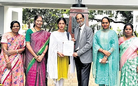 College chairman VM Muralidharan handed over the admission letter to Shivin in presence of principal S Uma Gowrie and other staff.