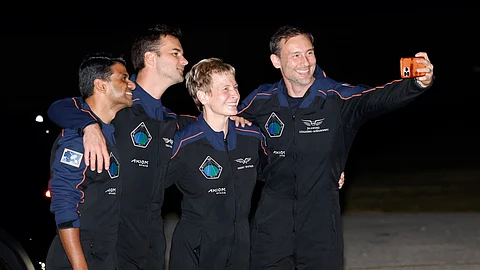 SpaceX Falcon 9 crew pose for a selfie before departing for a launch to the International Space Station at the Kennedy Space Center in Cape Canaveral, Fla., Tuesday, June 24, 2025.