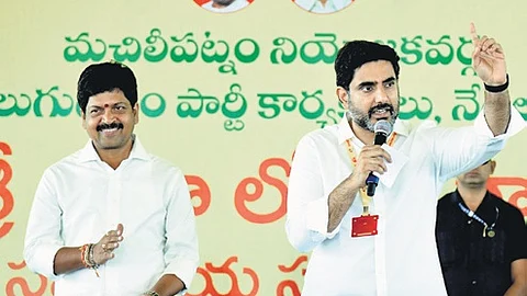 Minister for IT Nara Lokesh interacts with cadre in Machilipatnam on Wednesday.