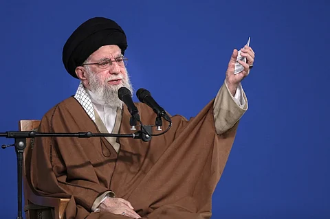 In this photo released by the official website of the office of the Iranian supreme leader, Supreme Leader Ayatollah Ali Khamenei speaks to a group of people and officials in Tehran, Iran, Friday, March 21, 2025.