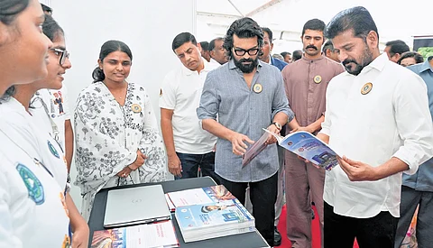Chief Minister A Revanth Reddy, actors Ram Charan and Vijay Devarakonda at a stall during an International Day Against Drug Abuse event in Hyderabad on Thursday