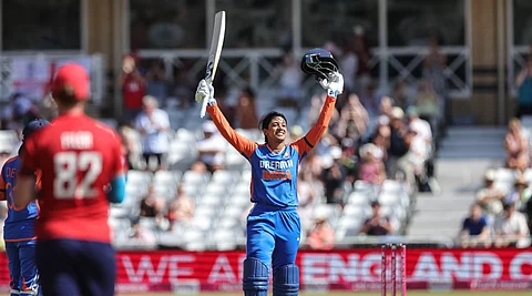 Smriti Mandhana celebrates after reaching her century.