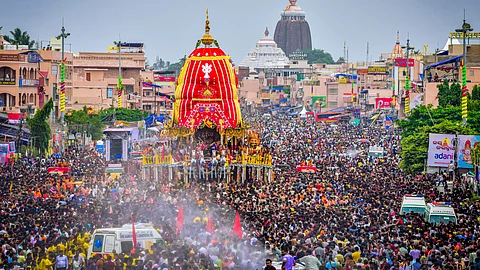 People pull the chariot of Lord Jagannath during the annual 'Rath Yatra' festival, in Puri, Odisha, Saturday, June 28, 2025