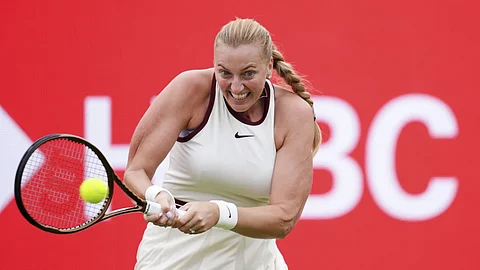 Czechia's Petra Kvitova hits the ball during her match against Brazil's Beatriz Haddad Maia, not pictured, on day one of the HSBC Championships at The Queen's Club, in London, Monday, June 9, 2025.