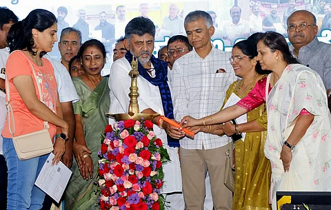 DCM DK Shivakumar with Revenue Minister Krishna Byre Gowda inaugurated a programme for the distribution of E-Khata for the residents of Byatarayanapura constituency in Bengaluru on Sunday