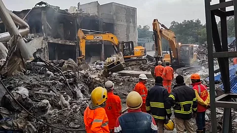Fire and rescue personnel during a rescue operation at the site of an explosion at the Sigachi Industries' pharma plant, in Sangareddy district, Telangana, Tuesday.