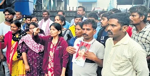 Family members of the workers stage a protest in front of Sigachi factory on Wednesday evening.