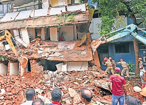 Rescue operations under way after a portion of a building at Kottayam Medical College Hospital collapsed