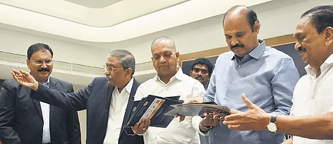 Ministers Kollu Ravindra and Kolusu Parthasarathy release the AP Chambers Business Excellence Awards - 2025 brochure in Vijayawada