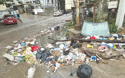 Overflowing garbage chokes the streets of Koti in Hyderabad after recent rains