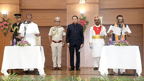 Governor Indra Sena Reddy Nallu administered the oath of office and secrecy to Kishore Barman at the Raj Bhavan.