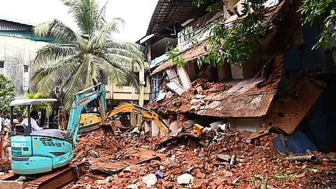Fire and rescue services officials at the buidling collapse site at Kottayam MCH on Thursday