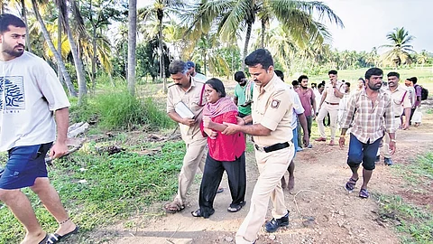 The law student Pavithra who jumped into Cauvery river being rescued by the officials