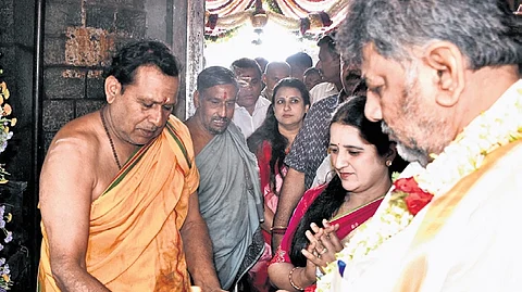 DyCM DK Shivakumar and his wife Usha pray at Sri Chamundeshwari Temple atop Chamundi Hills on Ashada Friday in Mysuru