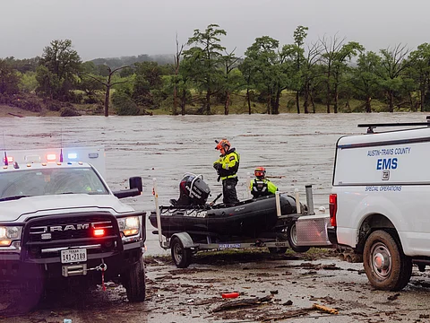 Members of Task Force 1 deploy boats along the Guadalupe River in the wake of a destructive flooding event in Kerrville on Friday July 4, 2025.
