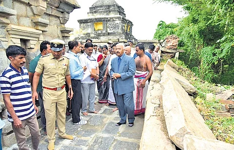 Upa Lokayukta Justice KN Phaneendra visits ancient Srirama Temple in Channapatna taluk on Saturday after the temple wall collapsed.