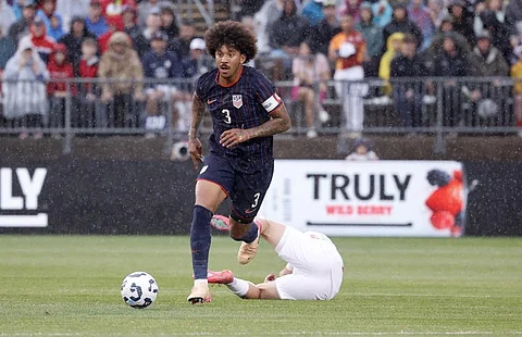 United States defender Chris Richards (3) dribble the ball up the field past a fallen Turkey defender during the first half of an international friendly soccer game, Saturday, June 7, 2025, in East Hartford, Conn.