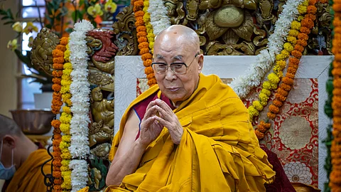 Tibetan spiritual leader the Dalai Lama presides over an event during which Tibetan exiles prayed for his longevity, a day before his 90th birthday, in Dharamshala, India, Saturday, July 5, 2025.