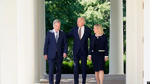 President Joe Biden accompanied by Swedish Prime Minister Magdalena Andersson and Finnish President Sauli Niinisto, walks out to speak in the Rose Garden of the White House , May 19, 2022.