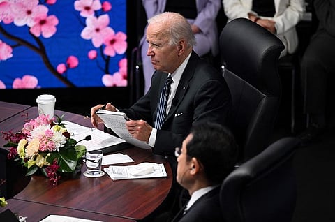 US President Joe Biden and Japan's Prime Minister Fumio Kishida attend the Indo-Pacific Economic Framework for Prosperity with other regional leaders via video link at the Izumi Garden Gallery in Tokyo, May 23, 2022.