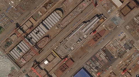This satellite image from Planet Labs PBC shows the construction of China's Type 003 aircraft carrier at the Jiangnan Shipyard northeast of Shanghai, China, on May 8, 2022.