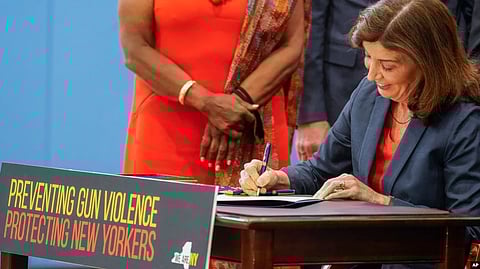 New York Gov. Kathy Hochul signs a package of bills to strengthen gun laws, June 6, 2022.