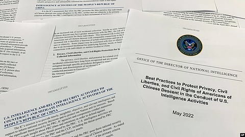 A photo, taken June 14, 2022, of a report by the Office of the Director of National Intelligence. U.S. officials acknowledge that, while U.S. agencies gather information about China, they also might end up collecting information about Chinese Americans.
