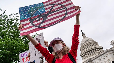 Activists demand action on gun control legislation, at the Capitol, in Washington, May 26, 2022.