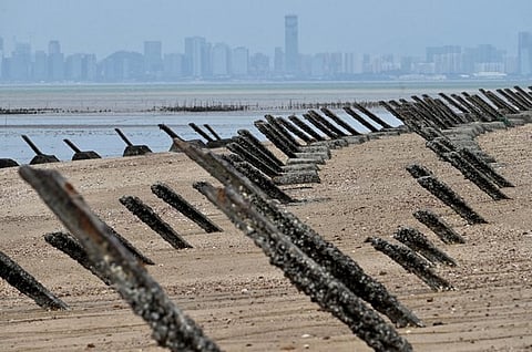 This photo taken on October 20, 2020 shows anti-landing spikes placed along the coast of Taiwan's Kinmen islands, which lie just 3.2 kms (two miles) from the mainland China coast (in background) in the Taiwan Strait.