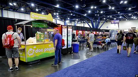 Food vendors and tables occupy the area where Daniel Defense was to have its booth at the National Rifle Association annual meeting in Houston, May 27, 2022. Daniel Defense, maker of the \rifle used in the Uvalde, Texas, shooting, pulled out of the convention after the shooting.